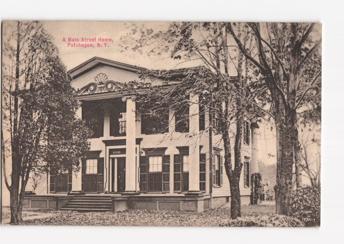Historic Main Street Home, Patchogue, New York, circa 1905, black and white photograph postcard: Please review the photos carefully for additional condition details. Note that scans may appear slightly darker or lighter than the item's true appearance, and minor scanning artifacts may be visible.