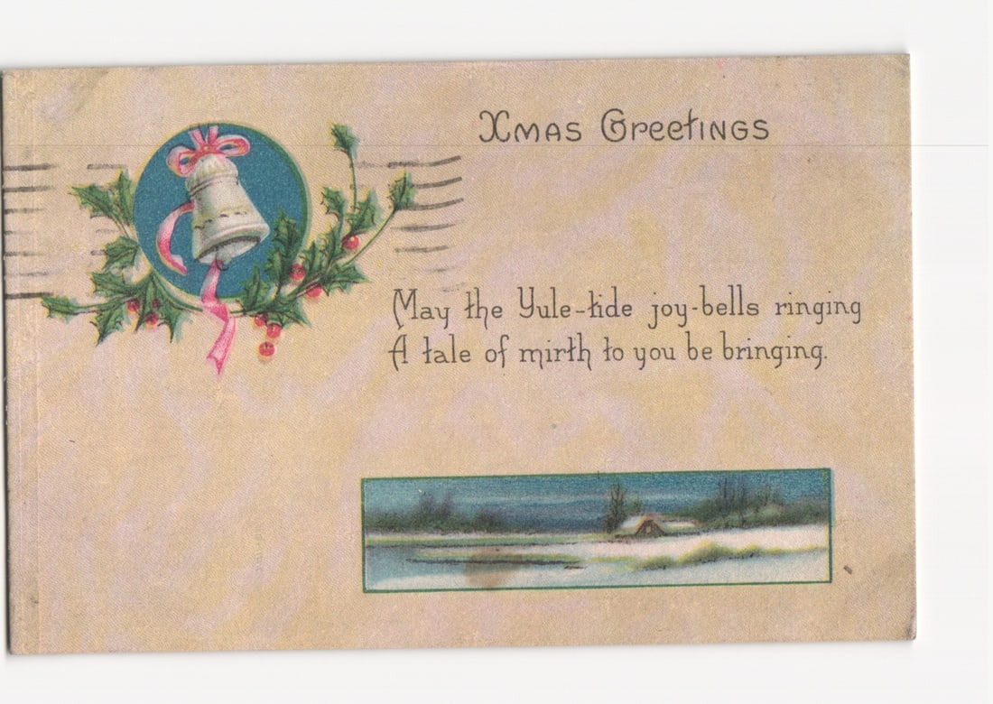 1920 Christmas Greetings Postcard, Illustrating a Bell, Holly, and Winter Landscape Scene: Please review the photos carefully for additional condition details. Note that scans may appear slightly darker or lighter than the item's true appearance, and minor scanning artifacts may be visible.