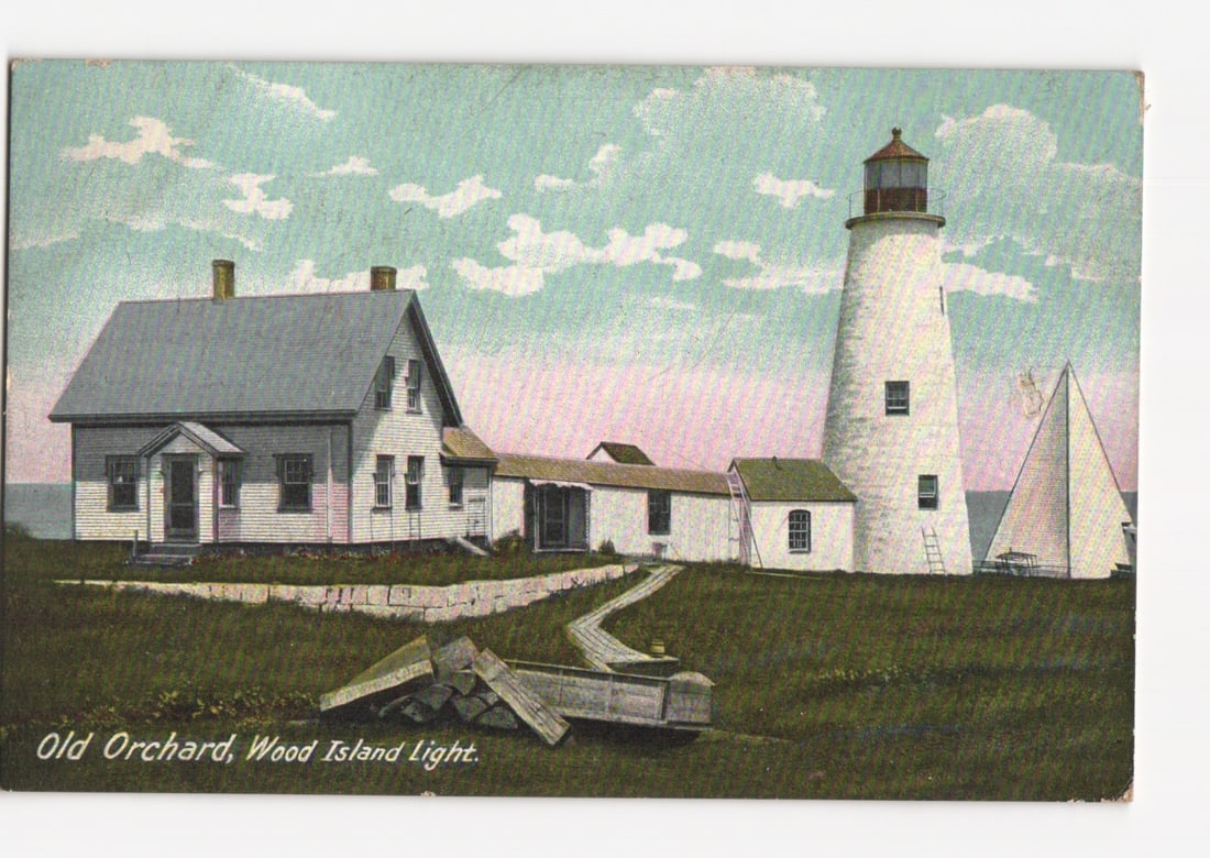 Historic colored lithograph postcard of Wood Island Light Station in Old Orchard, Maine, c. 1911.: Please review the photos carefully for additional condition details. Note that scans may appear slightly darker or lighter than the item's true appearance, and minor scanning artifacts may be visible.