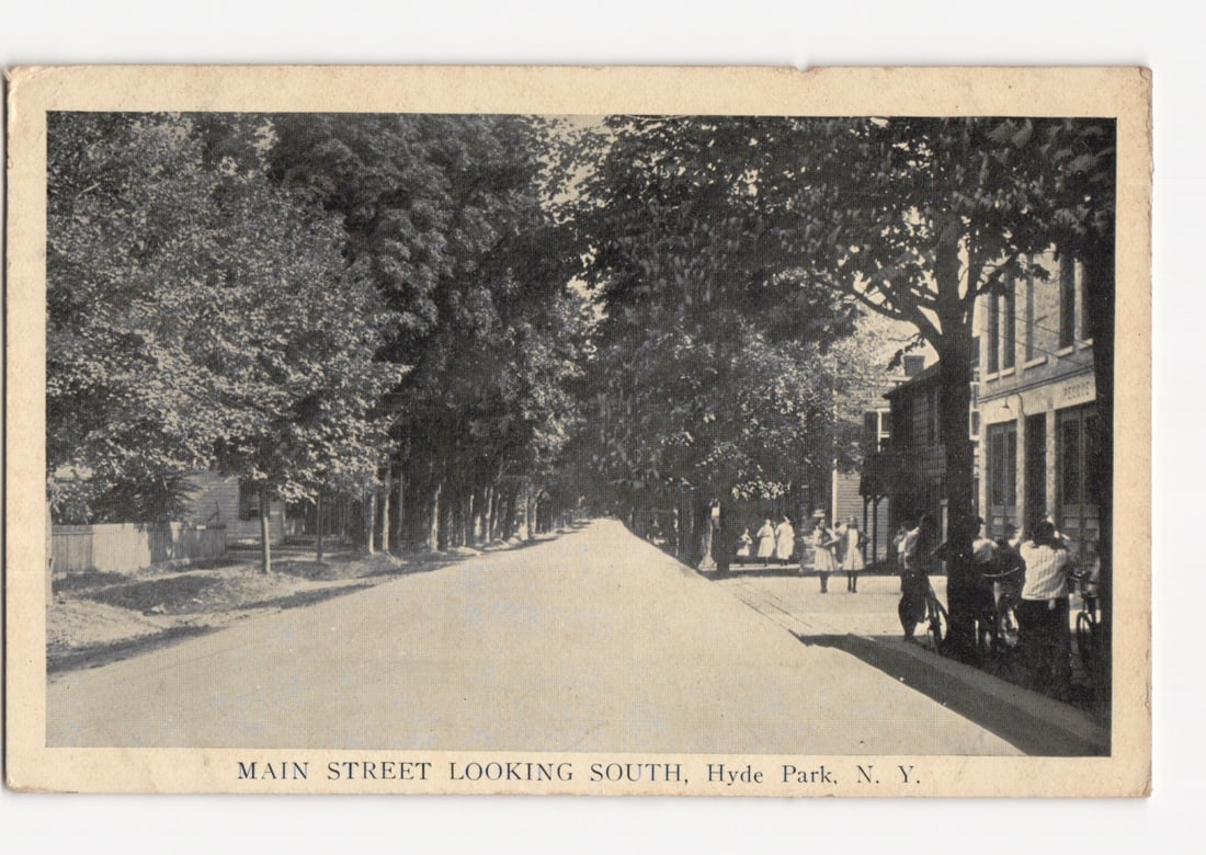 Main Street Looking South in Hyde Park, New York, with Figures and Trees, 1917 Postcard: Please review the photos carefully for additional condition details. Note that scans may appear slightly darker or lighter than the item's true appearance, and minor scanning artifacts may be visible.