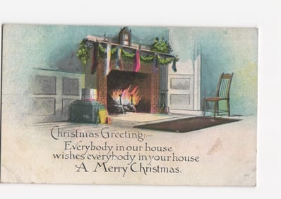 Antique Christmas Greeting postcard featuring fireplace, stockings, and festive decor, circa 1913.