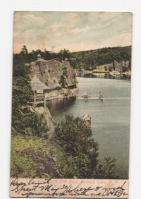 Scenic postcard of Mohonk Lake from Eagle Cliff Road, New York, with lakeside pavilions, circa 1906.