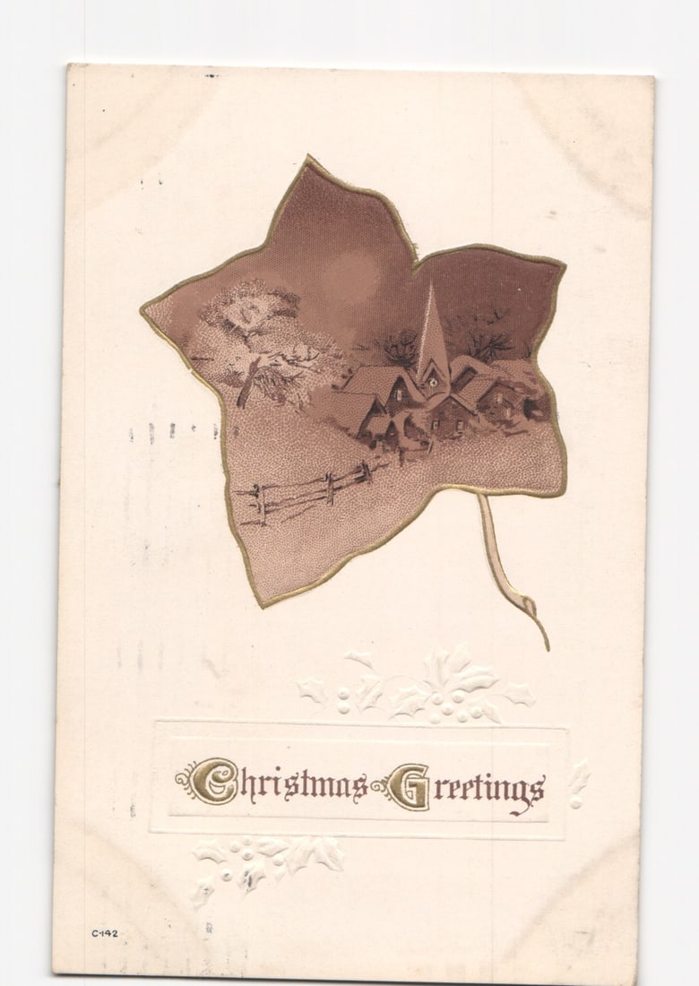 Early 20th Century Christmas Postcard: Embossed Winter Village Scene in Stylized Ivy Leaf Design: Please review the photos carefully for additional condition details. Note that scans may appear slightly darker or lighter than the item's true appearance, and minor scanning artifacts may be visible.