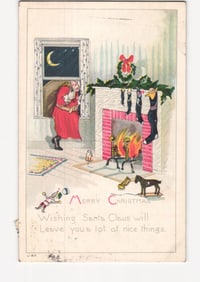 Vintage chromolithograph postcard of Santa Claus entering a window on Christmas Eve, 1919 postmark.