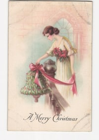 Artistic postcard depicting a woman decorating with a holly wreath and red ribbon for Christmas