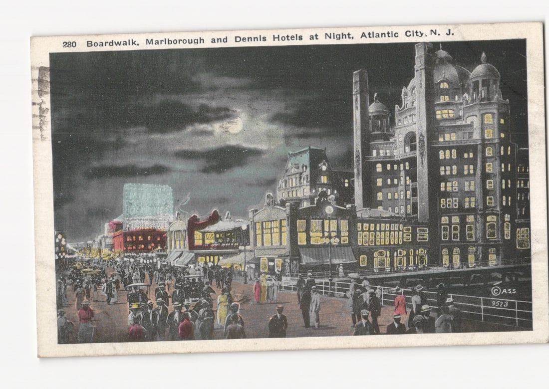 Boardwalk, Marlborough and Dennis Hotels at Night, Atlantic City, New Jersey, 1920s postcard: Please review the photos carefully for additional condition details. Note that scans may appear slightly darker or lighter than the item's true appearance, and minor scanning artifacts may be visible.