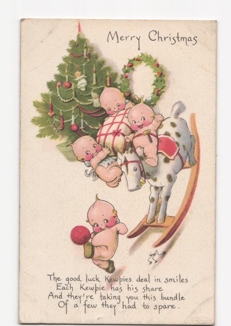 Vintage Merry Christmas postcard with Kewpie babies, Christmas tree, and rocking horse, 1921. (1 of 2)