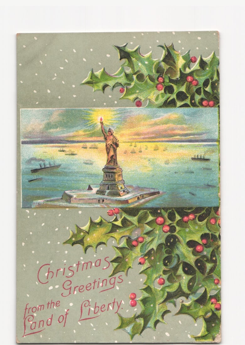 1911 Christmas postcard depicting Statue of Liberty in New York Harbor with holly border: Please review the photos carefully for additional condition details. Note that scans may appear slightly darker or lighter than the item's true appearance, and minor scanning artifacts may be visible.