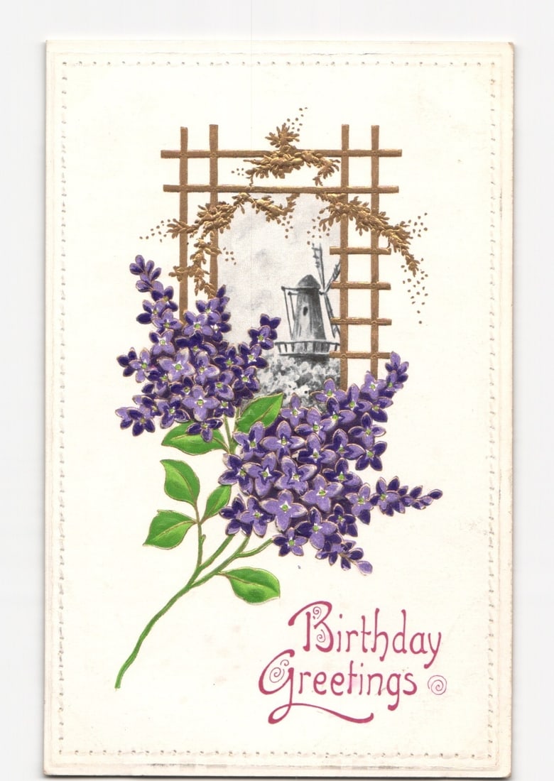 Early 20th Century Birthday Greetings postcard with purple lilacs, decorative trellis, and windmill. (1 of 2)