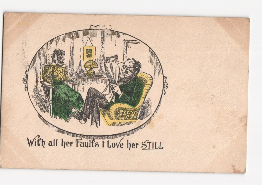 Illustrated Postcard: Domestic Scene with Couple, Sent from Townsend, Massachusetts, Dated 1911.: An illustrated domestic scene is depicted within an oval vignette. A bearded man is seated in a patterned armchair, engrossed in reading a newspaper. Opposite him, a woman sits at a small table, weari