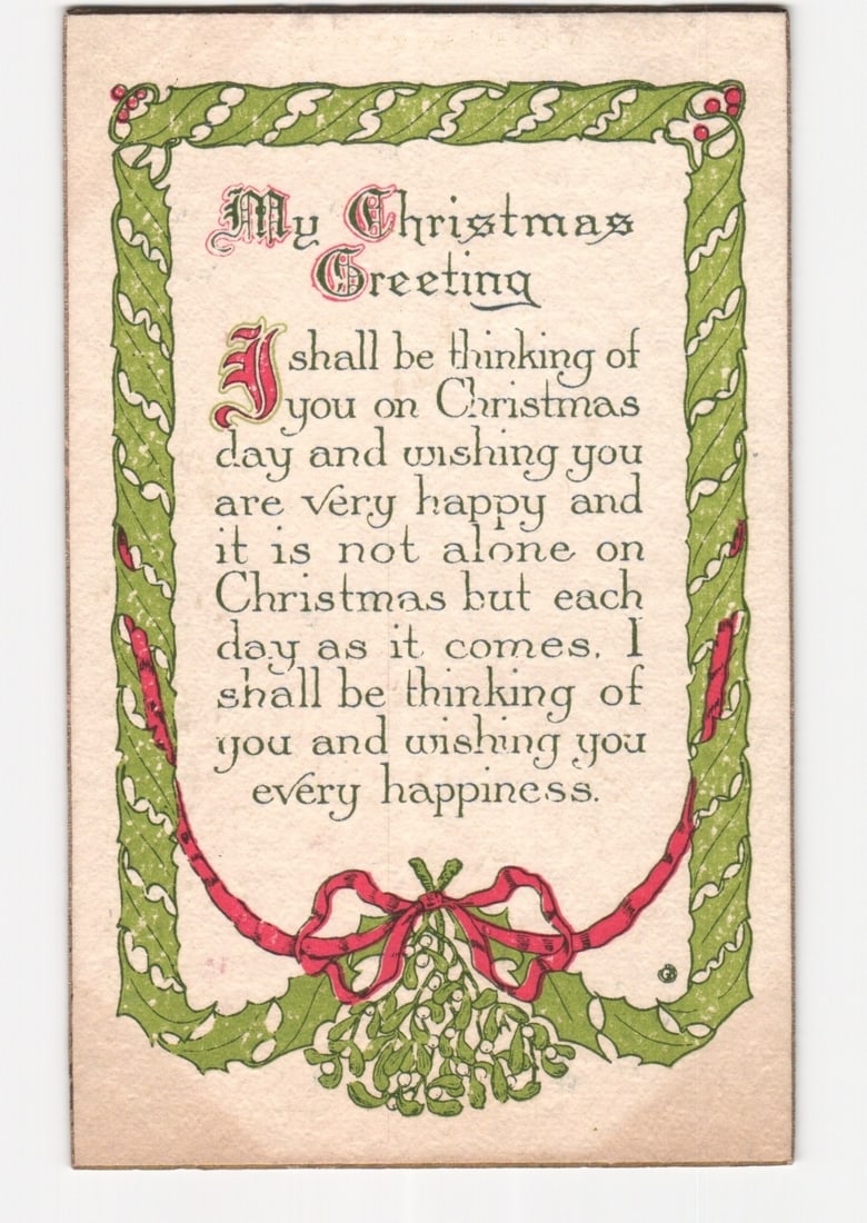 1909 M.T. Sheahan Christmas Greeting postcard with ornate holly and mistletoe border (1 of 2)