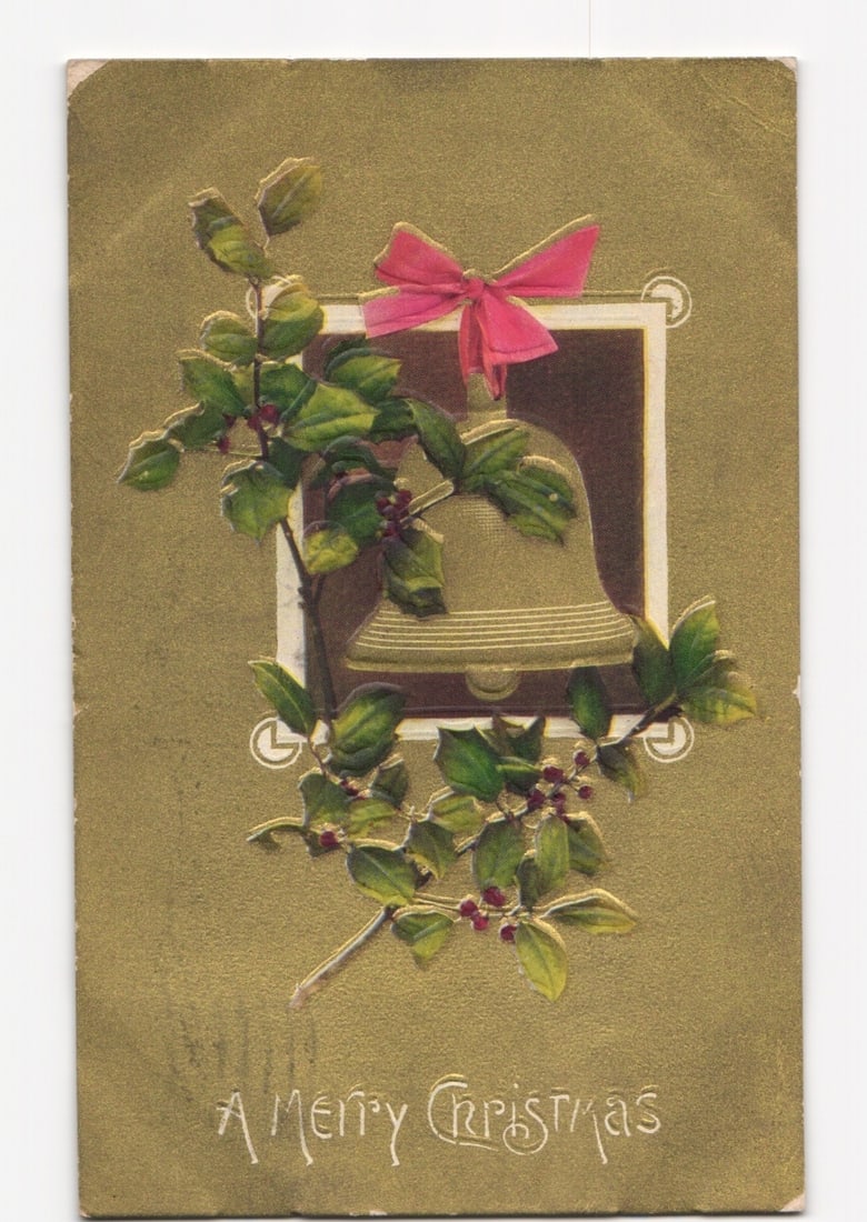 Embossed Chromolithograph Christmas Postcard with Gilded Bell and Holly, Somerville, 1909: A festive embossed chromolithograph depicting a gilded bell centered within a white square frame, adorned with a branch of green holly leaves and red berries. A pink bow is tied at the top of the fram