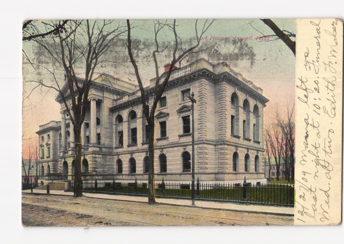 Impressive Court House Building in Lowell, Massachusetts, Early 1900s Lithograph Postcard: A grand neoclassical Court House building dominates the scene, featuring multiple stories, a prominent portico with columns, and arched windows on its upper floors. Bare deciduous trees frame the buil