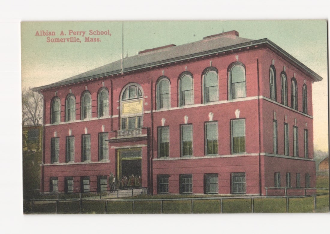 Albian A. Perry School, Somerville, Mass. Early 20th Century Lithograph Postcard: The Albian A. Perry School in Somerville, Massachusetts, is depicted from a frontal, slightly elevated perspective. The three-story brick structure features numerous arched windows on the upper levels