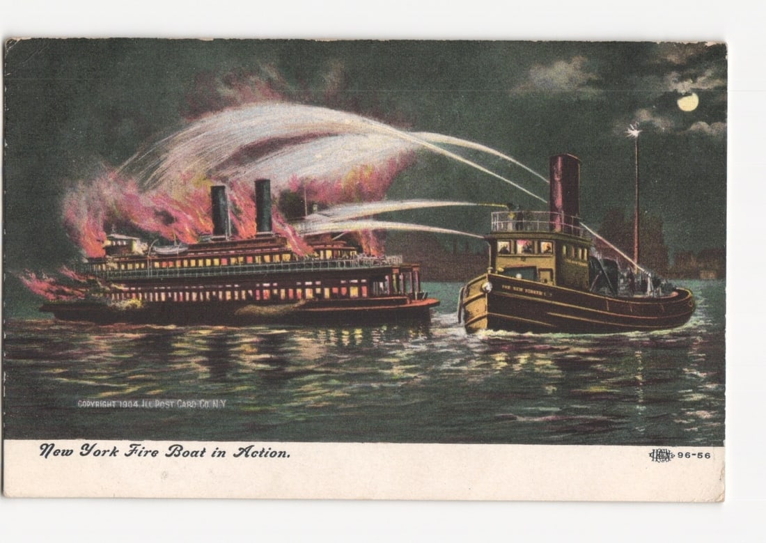 Vivid chromolithograph postcard of a New York Fire Boat in Action battling a blazing ship, 1904.: A large, multi-deck paddle steamer is depicted engulfed in flames and thick smoke on open water at night. To its right, a fireboat identified as "THE NEW YORKER" directs multiple forceful streams of w