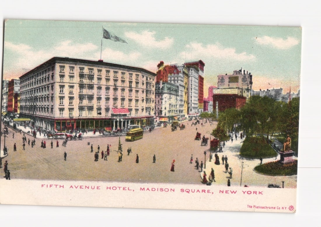 Fifth Avenue Hotel, Madison Square, New York, bustling street scene postcard.: The Fifth Avenue Hotel, a grand multi-story building with numerous windows, dominates the left side of this colored photographic print. A flag flies from its roof. The scene depicts a lively street in