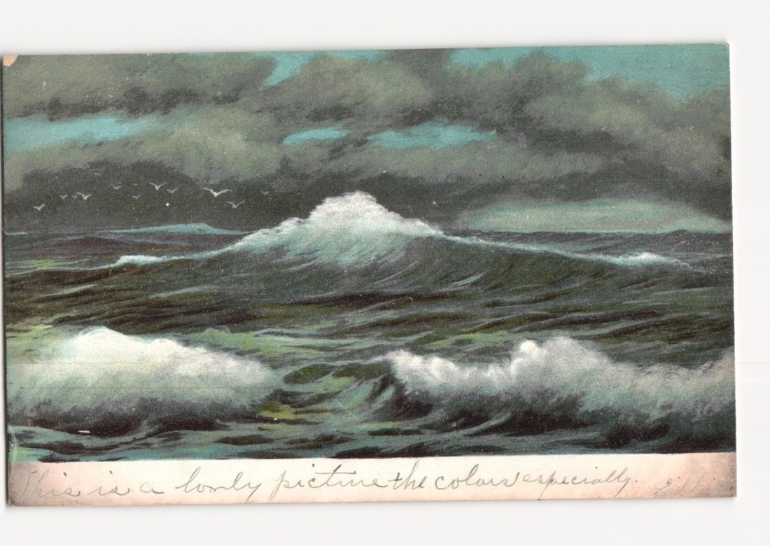 Dramatic Chromolithograph Postcard of Crashing Ocean Waves under a Stormy Sky, Early 20th Century.: A chromolithograph depicting a dramatic seascape with large, foamy waves crashing under a turbulent, dark sky. The central wave prominently crests with white foam against the darker green-blue sea. Sm