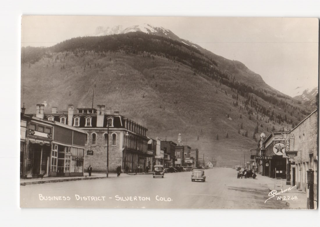 Silverton, Colorado Business District with Mountains RPPC, Circa 1930s-1940s Postcard. (1 of 2)