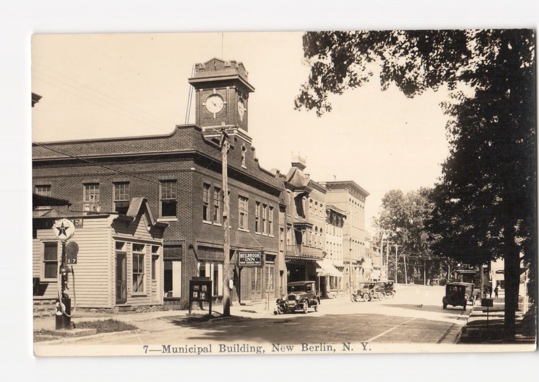 Street View of Municipal Building with Clock Tower, New Berlin, N.Y. Early 20th Century postcard. (1 of 2)