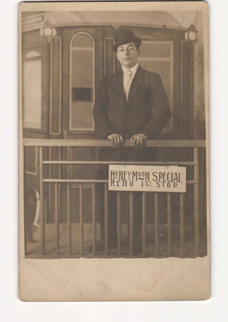 Formal portrait postcard of a man on 'Honeymoon Special' train car to Reno, Nevada (1 of 2)