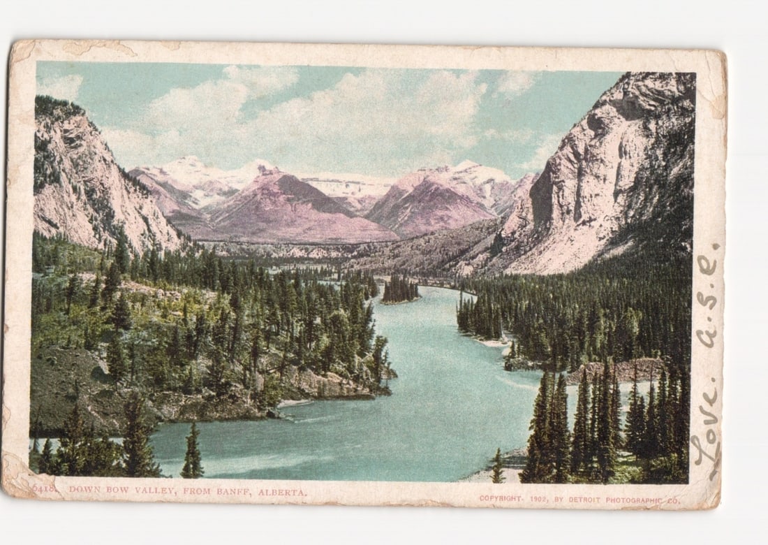 Early 1900s postcard: Bow Valley, Banff, Alberta, with mountains, forest, and lake vista. (1 of 2)