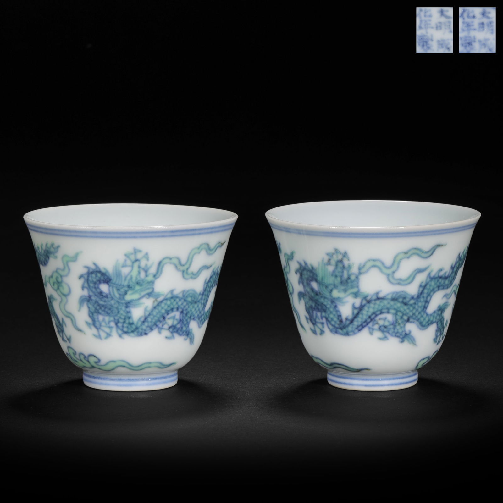 A pair of Ming Dynasty doucai dragon cups: A pair of Ming Dynasty doucai dragon cupsH5cm W5.5cm