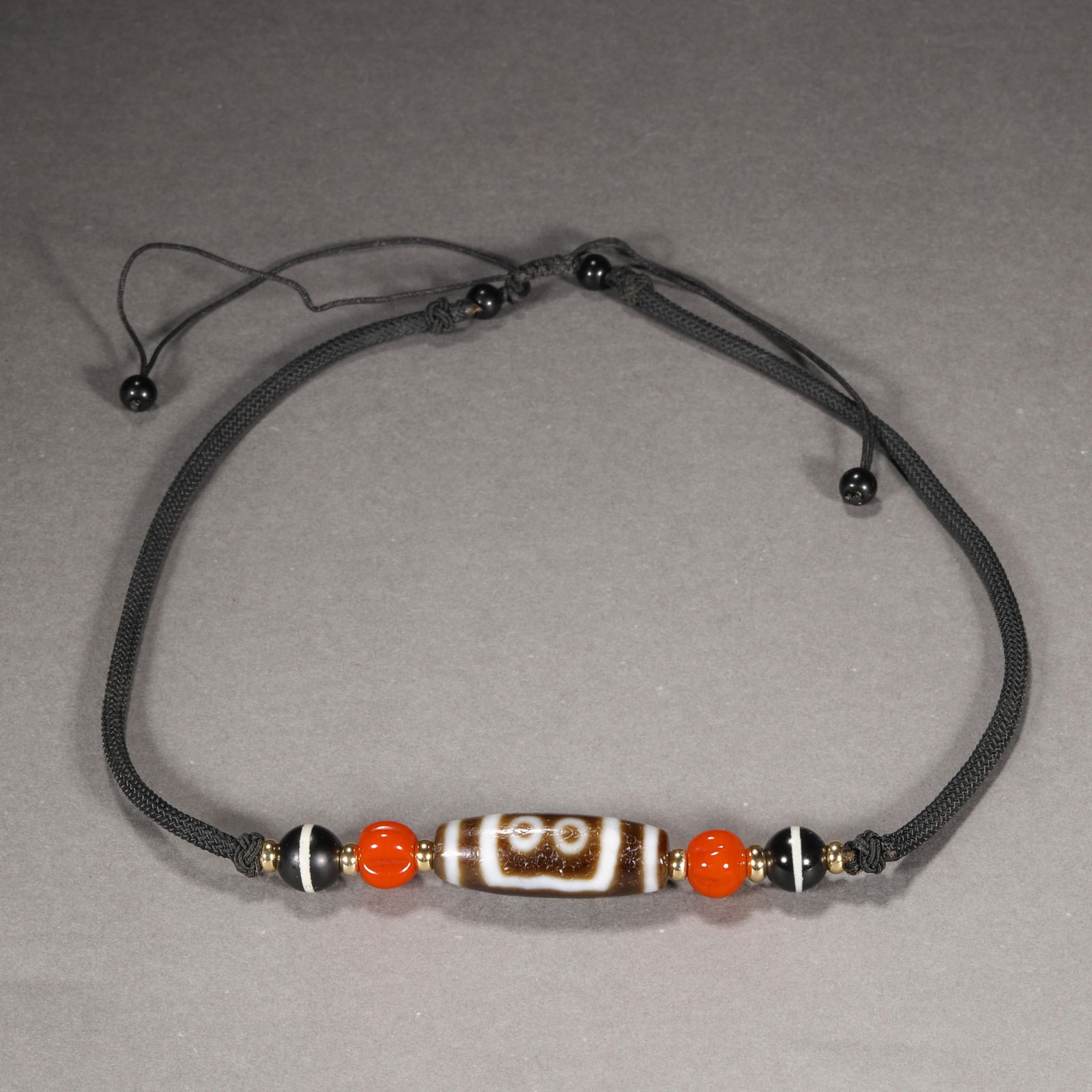 Tang Dynasty Three Eyes Dzi Beads: Tang Dynasty Three Eyes Dzi BeadsH3.6cm W1.3cm Wight21g