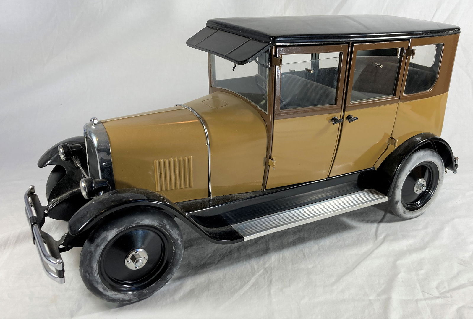 1927 Andre Citroen B-14 Large Scale Sedan By Brepsomy Toys France: This is a contemporary reproduction by Brepsomy of France of a 1920s original. This toy is in excellent condition showing minor wear and some dust from display. Number 569 of a limited run. Electrical