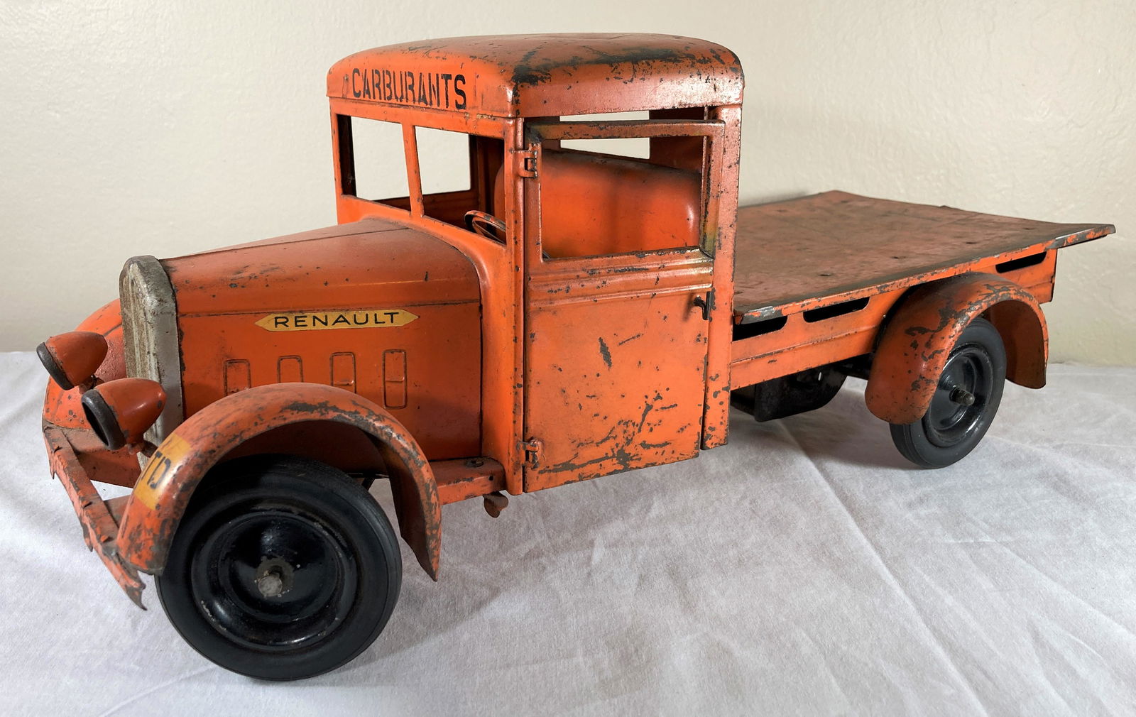 French Les Jouets CIJ Renault Carburants Fuel Delivery Flat Bed Tin Tinplate Toy Truck: This is a tough to find early tin toy. It appears to have original paint and shows wear consistent with play and age. Good condition overall. Some dust from display. Driver side door opens and functio
