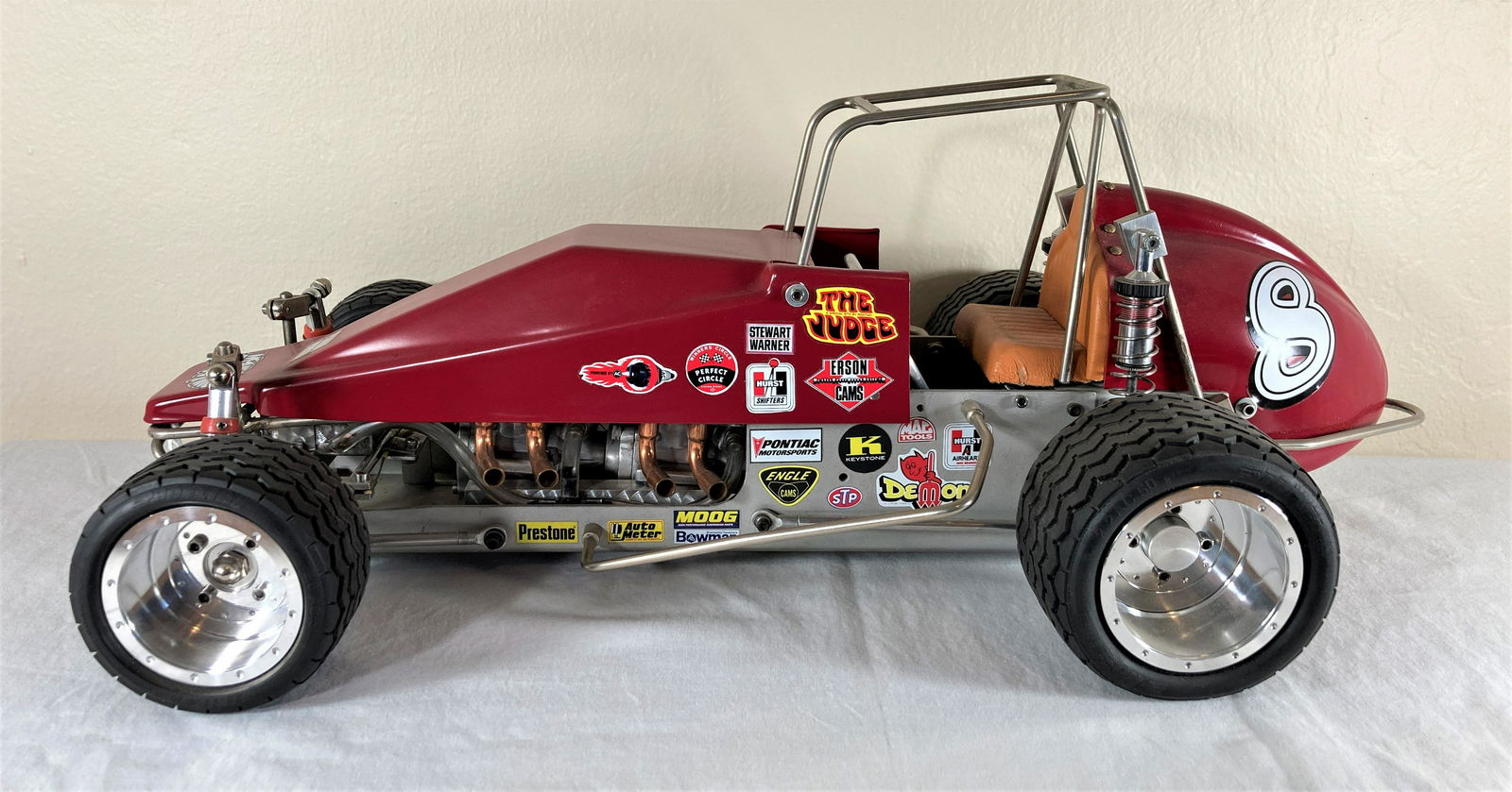 Moody Automotive Sprint RC Racecar Racer Model 1:8 Dynamic Suspension: This is a wonderful toy in very good condition. It shows minor wear overall. Some dust present from display. This appears to be a Roy Moody Automotive Production. The suspension work is just incredibl