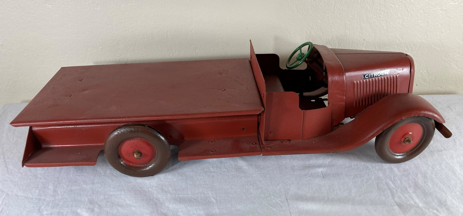 Les Jouets Andre Citroen Tin Tinplate Flat Bed Toy Truck: This is a very early toy. It has been “restored.” Condition is rough. Clockwork mechanism untested.