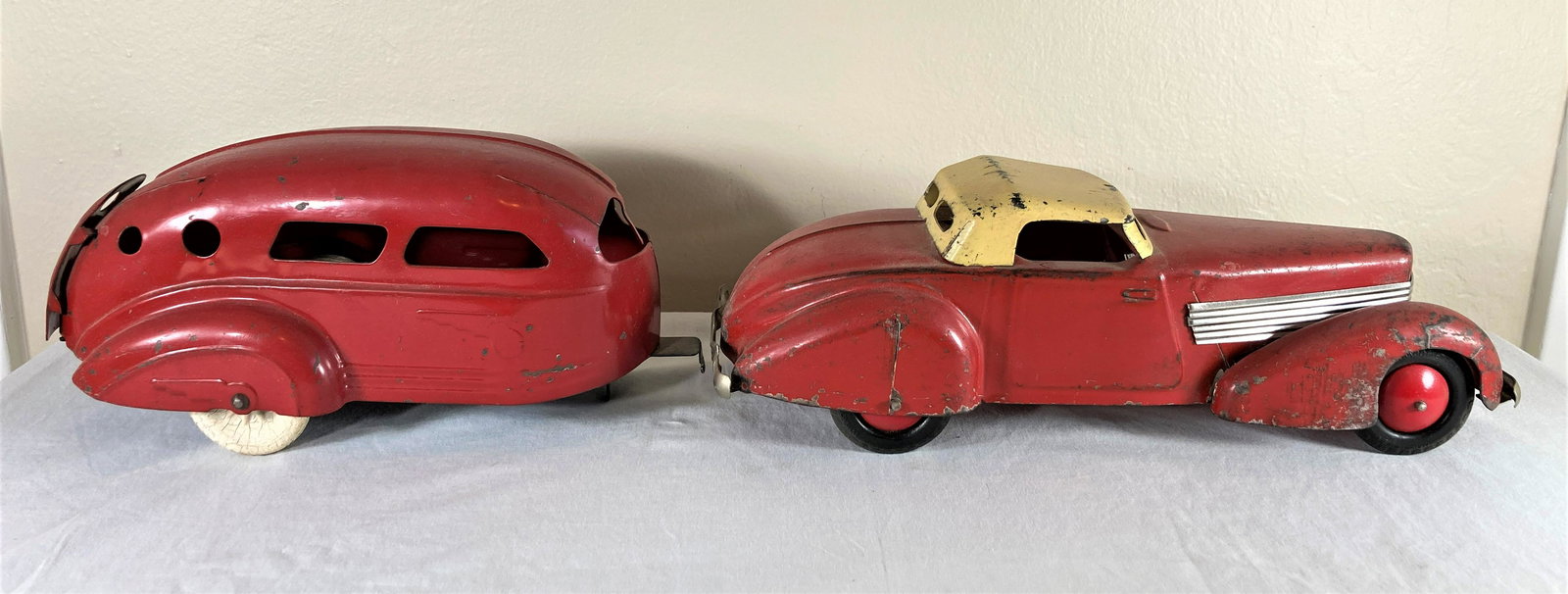 Wyandotte Pressed Steel Lassalle with Travel Trailer Toy Car: This is a very nice original toy. Paint looks original. Trailer door opens. Approximately 22 inches long.