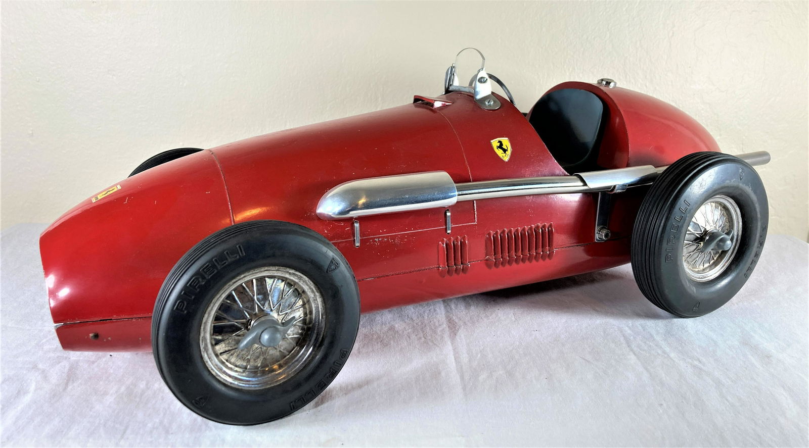 1952 Toschi Italy F2 Ferrari Red Grand Prix Tether Control Line Model Car Racer Racecar Spindizzy: This is an utterly incredible toy. Massive at 22 inches long. It was originally rubber band powered, but is now a tether car. The original grill is present behind a beautifully done wire one. The rubb