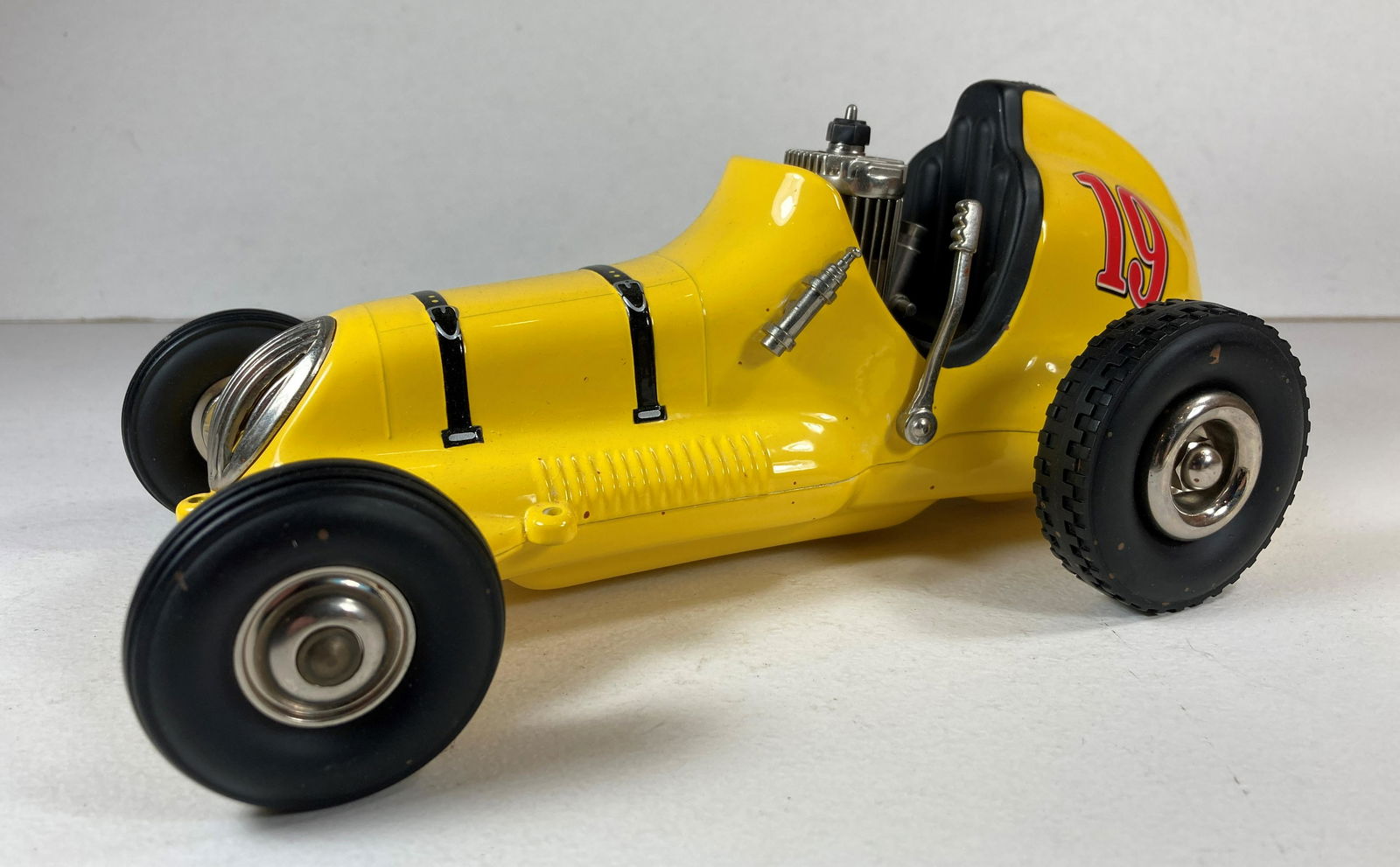 Nylint Cox Thimble Drome Tether Car Model Spindizzy Toy Yellow: This is a wonderful example of the 1990s Nylint Reissue. Some dust from display. Excellent condition overall. Engine and rear end present. New, never run.