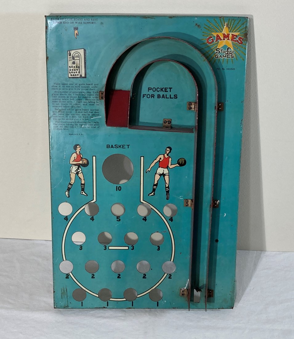 STARLINE GAMES BASKETBALL AN INTERESTING GAME OF SKILL: This is a nice piece in used condition. No marbles included