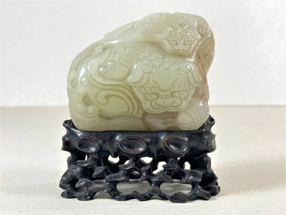 China Chinese White Jade Carved Dragon w/ Zitan Stand: This is a wonderful 19th century piece. The workmanship is just excellent. Believed to be white jade.