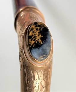 1860s California Gold Rush Walking Stick Cane: This is a nice piece approximately 35 inches long. The shaft appears to be ebony. The handle is gold with a gold quartz inlays.