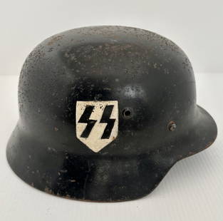 Vintage German WWII World War Two SS Helmet with Tri Color Shield & SS: This is a Vintage German WWII World War Two SS Helmet with Tri Color Shield & SS painted insignias. The paint is heavy enough on the inside I do not see the number stamps. Liner is fair. The insignias