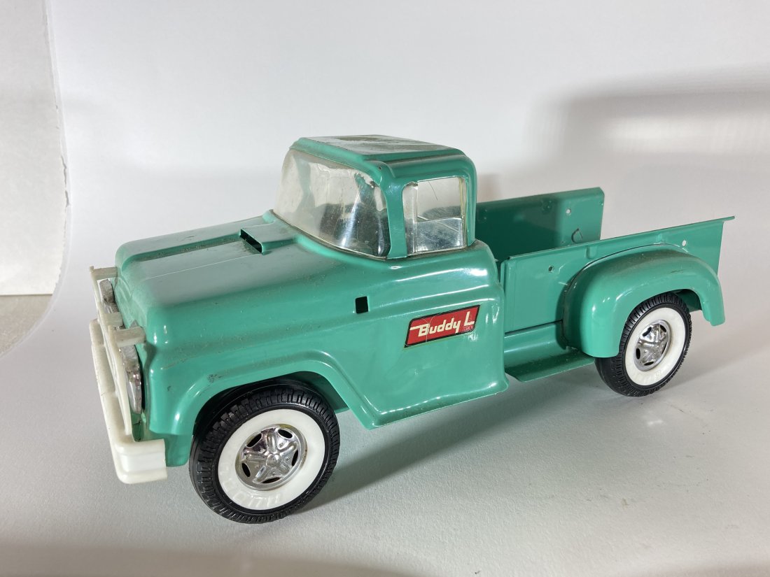 Buddy L Pressed Steel Toy Pick-Up Truck: This is a nice vintage piece in used condition. It shows some wear from play and comes as shown.