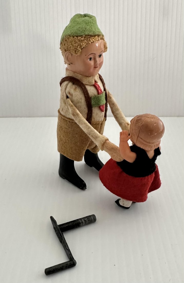 Antique Vintage Tin Wind Up Schuco Boy with Bouncing Baby (1 of 6)