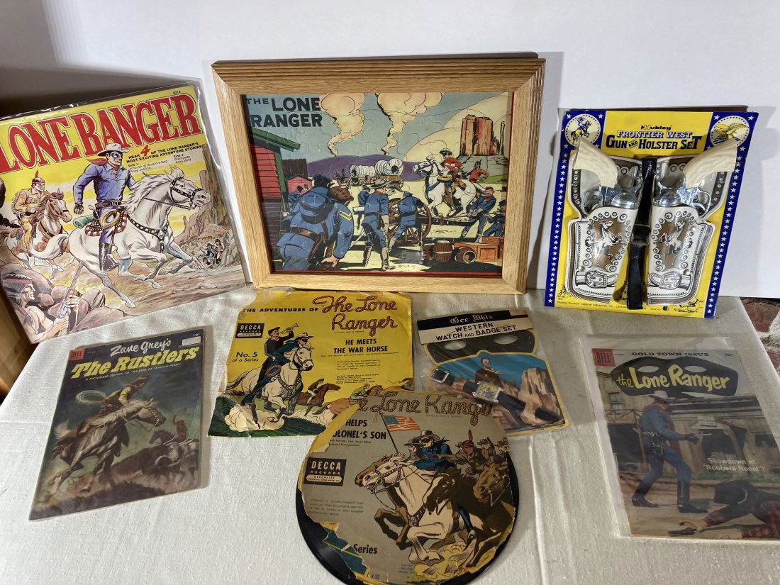 Vintage Lone Ranger Collectibles Lot: Wonderful lot of vintage Long Ranger Collectibles. A couple records, comic book, puzzle, cap guns.