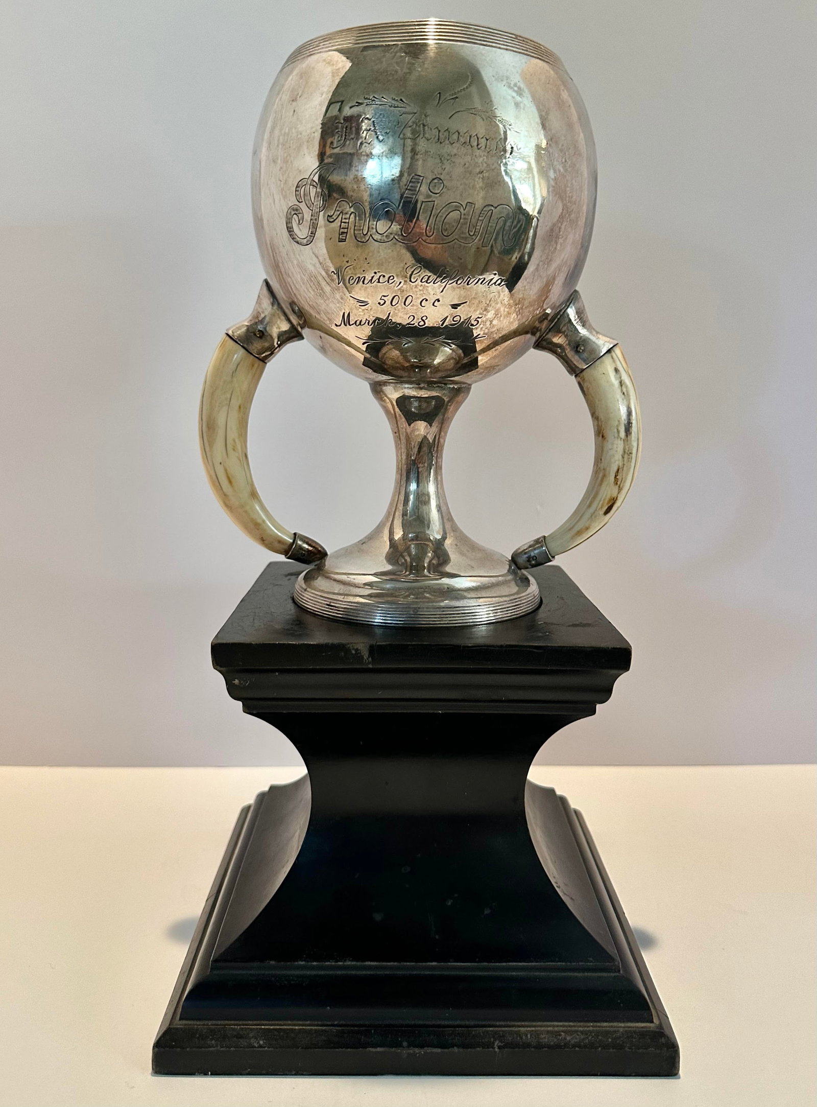 RARE Antique 1915 Indian Motorcycle Venice CA 500cc Racing Trophy: This is a RARE Antique 1915 Indian Motorcycle Venice California March 28, 1915 500cc Racing Trophy. It measures 15 inches tall on the base. Engraved INDIAN with the Indian Motorcycle font. Also states