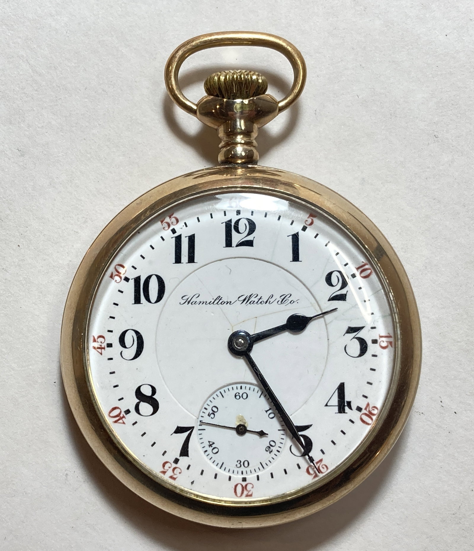 Hamilton Watch Co Railroad Conductor Pocket Watch 21 Jewel: This is a really nice vintage piece in very good condition. The case is 10kt gold filled. Some cracking on face. Runs. Diameter without the stem is approx 2 1/8 inches.