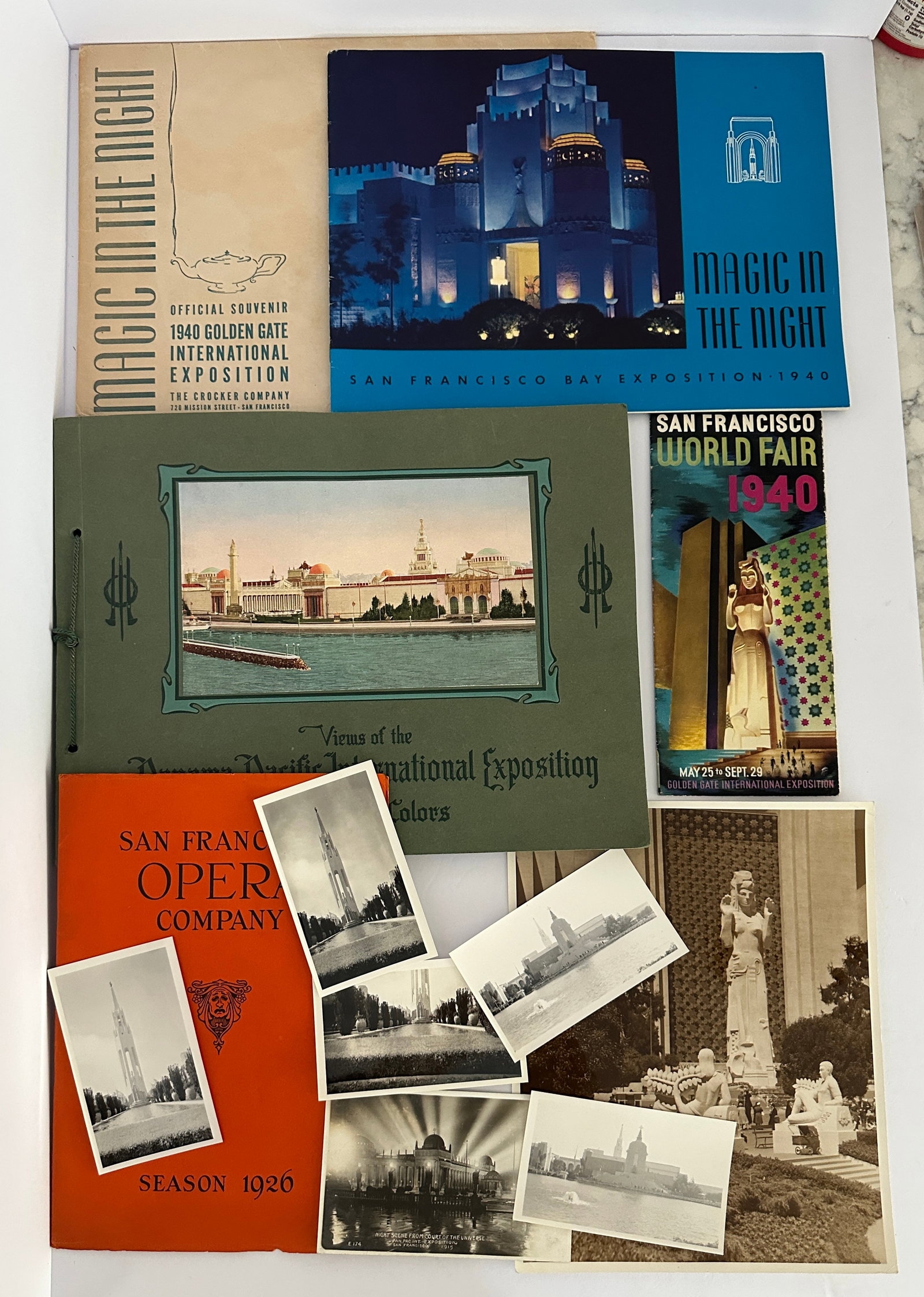 Lot of San Francisco Worlds Fair International Exposition Ephemera: This is a Lot of San Francisco Worlds Fair International Exposition Ephemera. Including a very nice large 1915 PPIE Color Photo Souvenir book, a 1940 Exposition Magic in the Night Souvenir Book with o