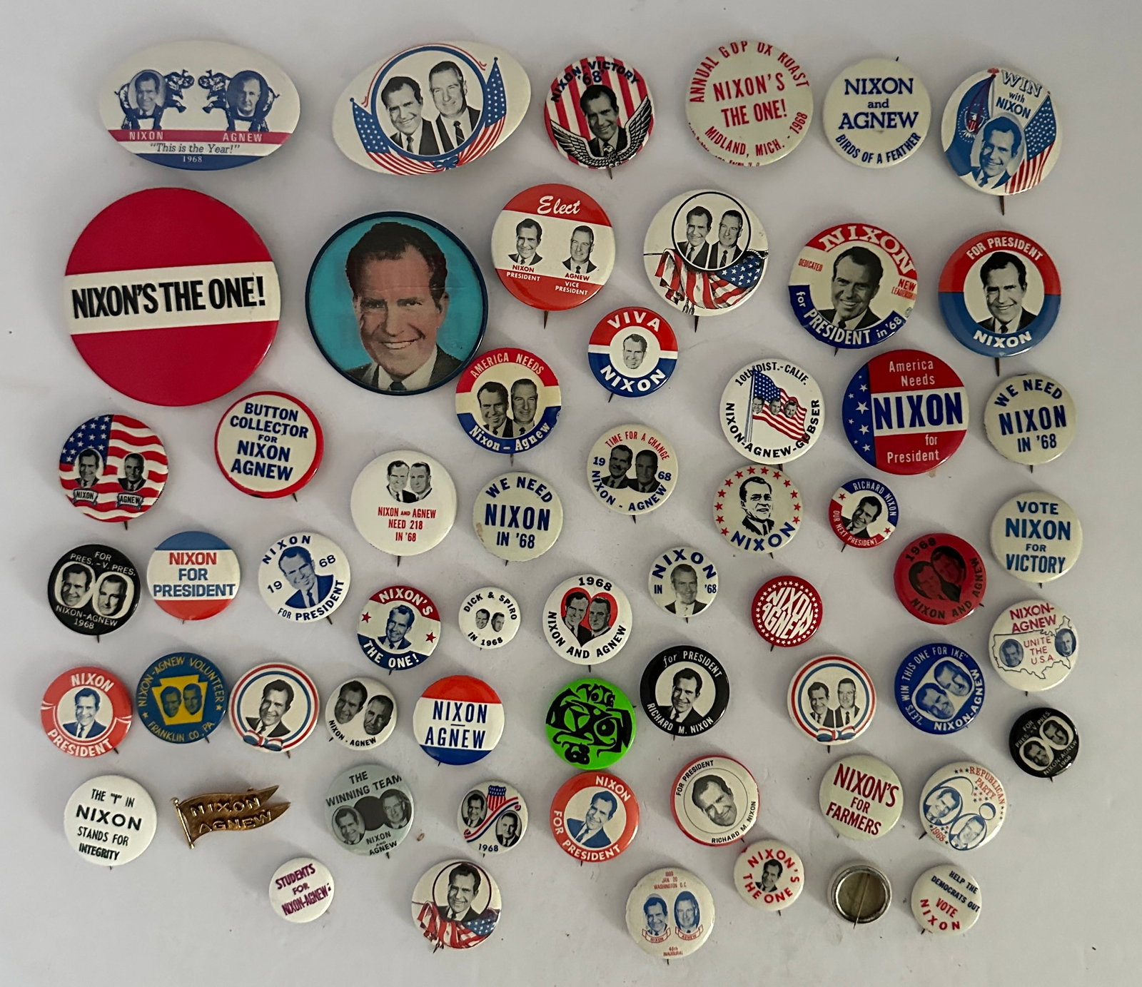 Lot of Vintage 1960s 70s Richard Nixon Campaign Buttons: Lot of Vintage 1960s 70s Richard Nixon Campaign Buttons...Many unique variations with the largest 4 inches diameter.