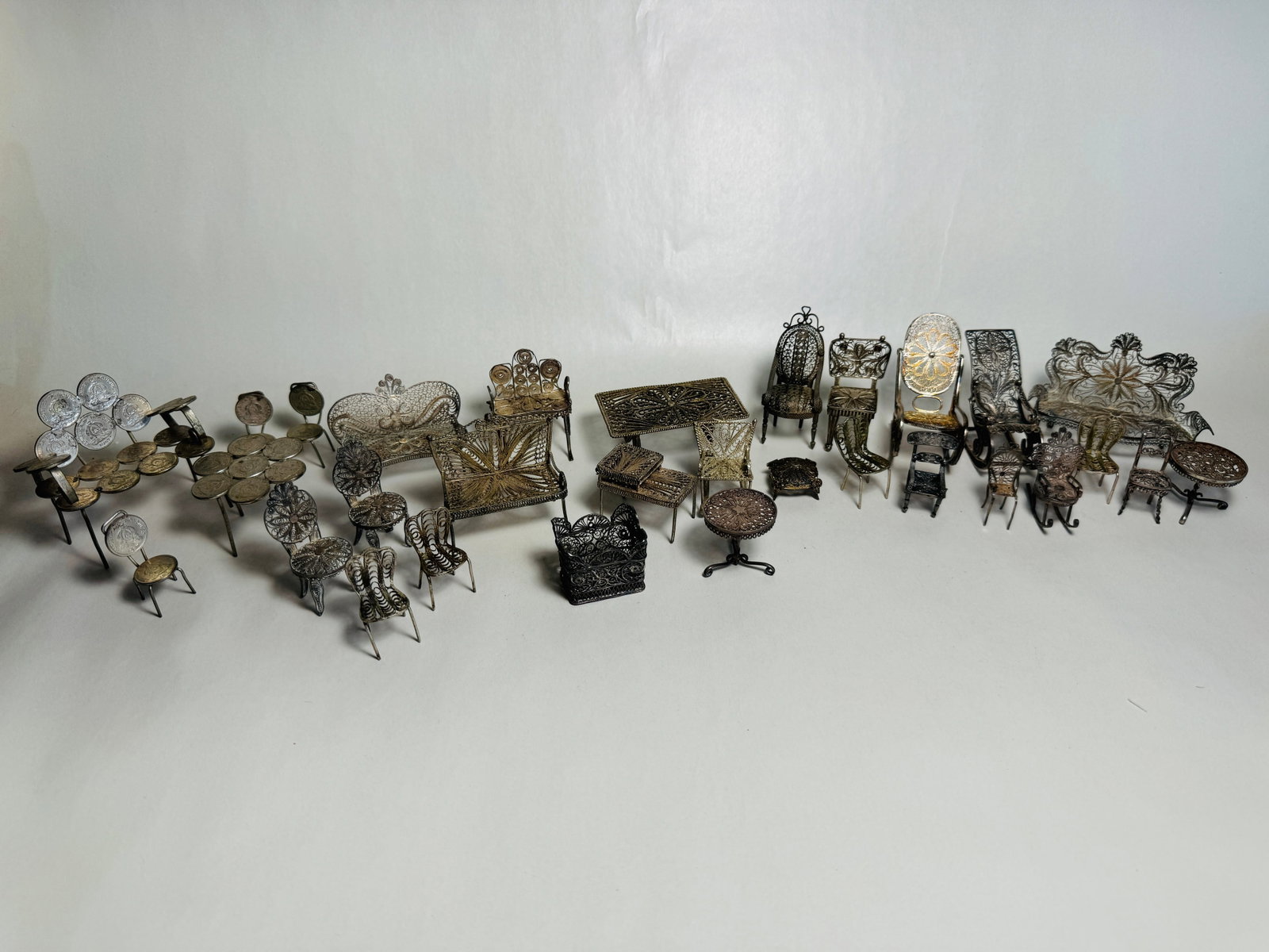 Vintage Dollhouse Handmade Sterling Filigree & Coin Furniture: This is an very nice lot with an extensive array of finely detailed articles.