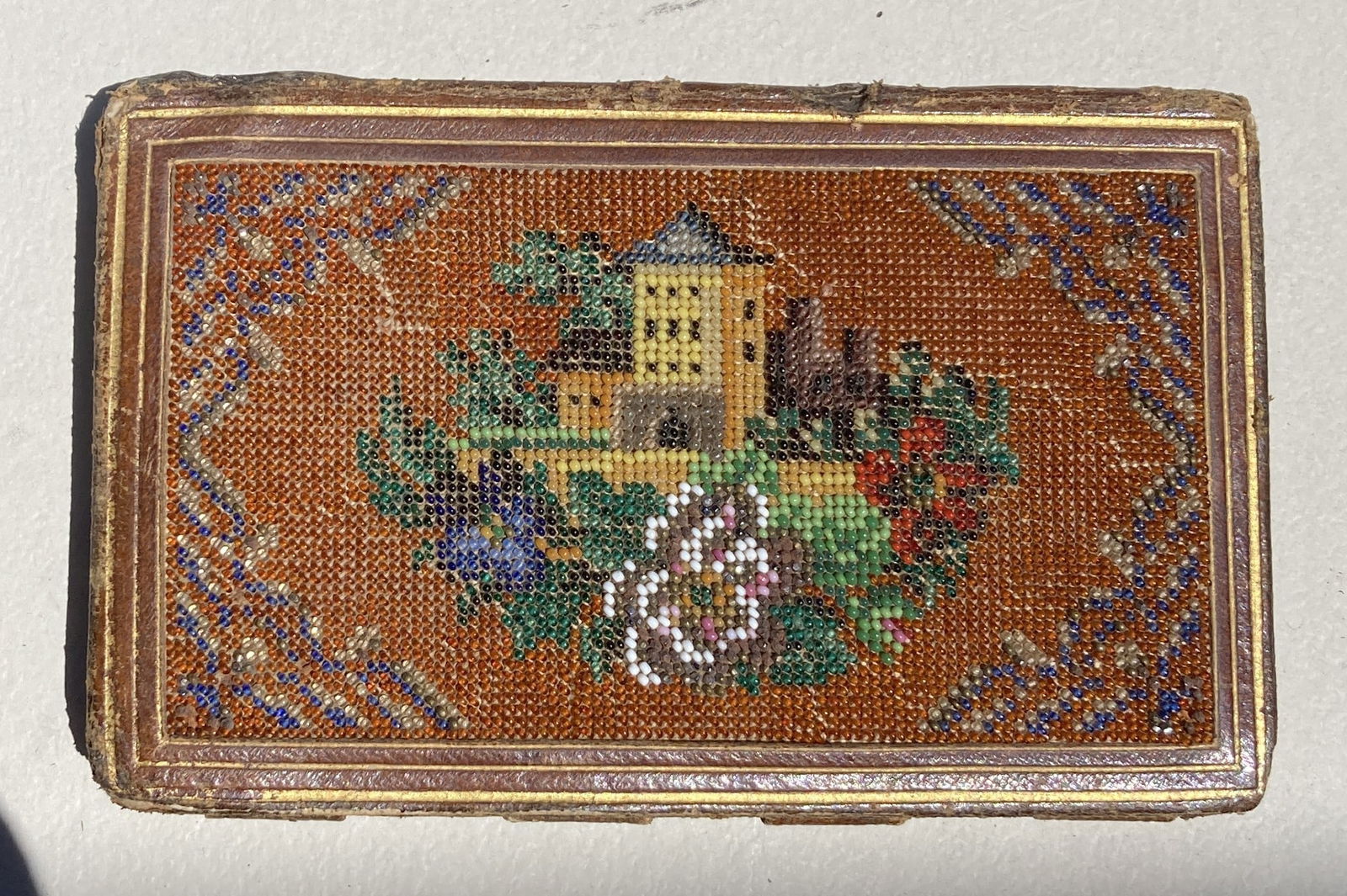 1800s Victorian Beaded Journal Notebook: This is a very nice vintage piece. It is very old and shows its age. It is missing it's original pencil. There are notes inside.