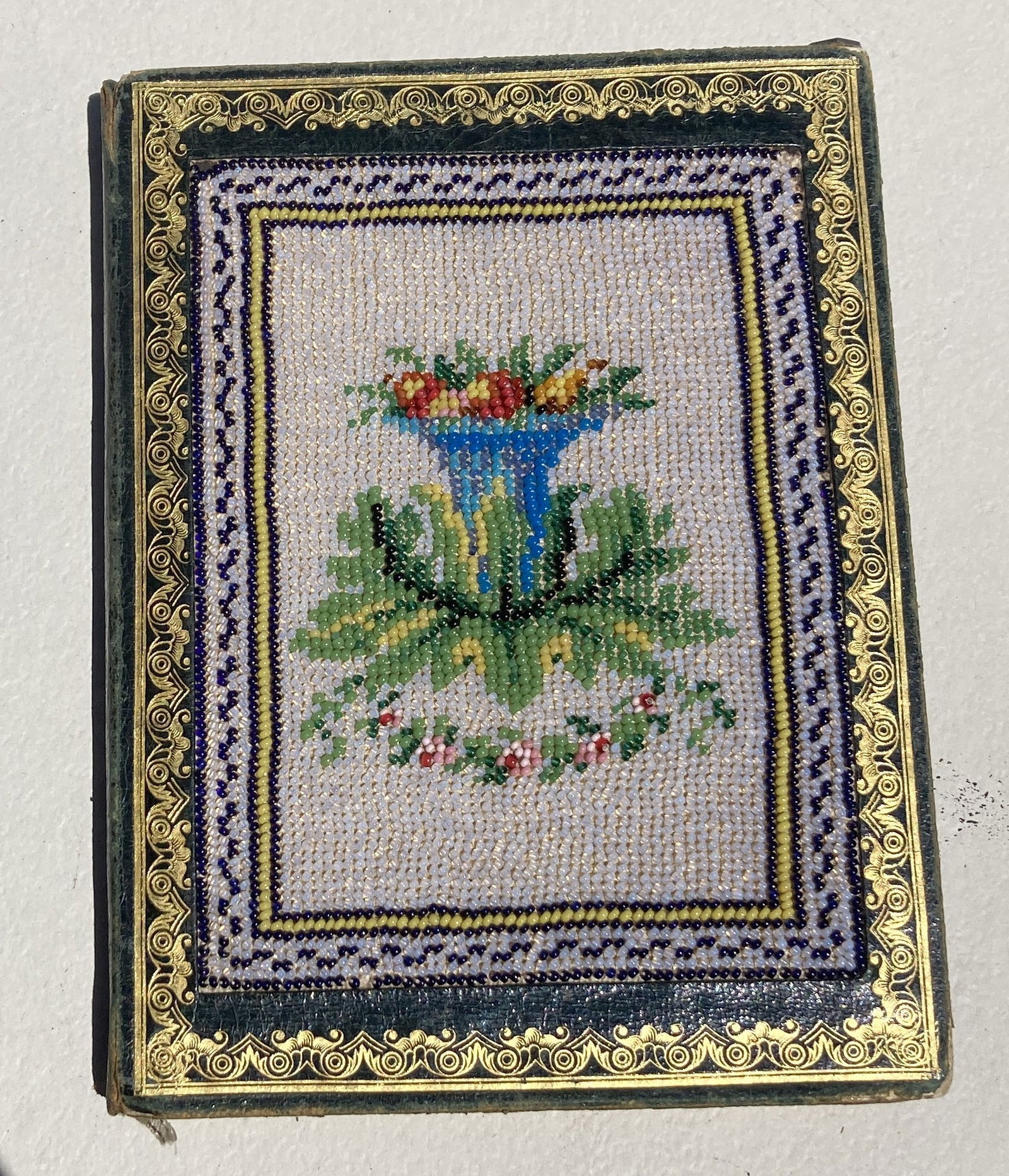 1800s Victorian Beaded Journal Notebook: This is a very nice vintage piece. It is very old and shows its age. It shows wear.