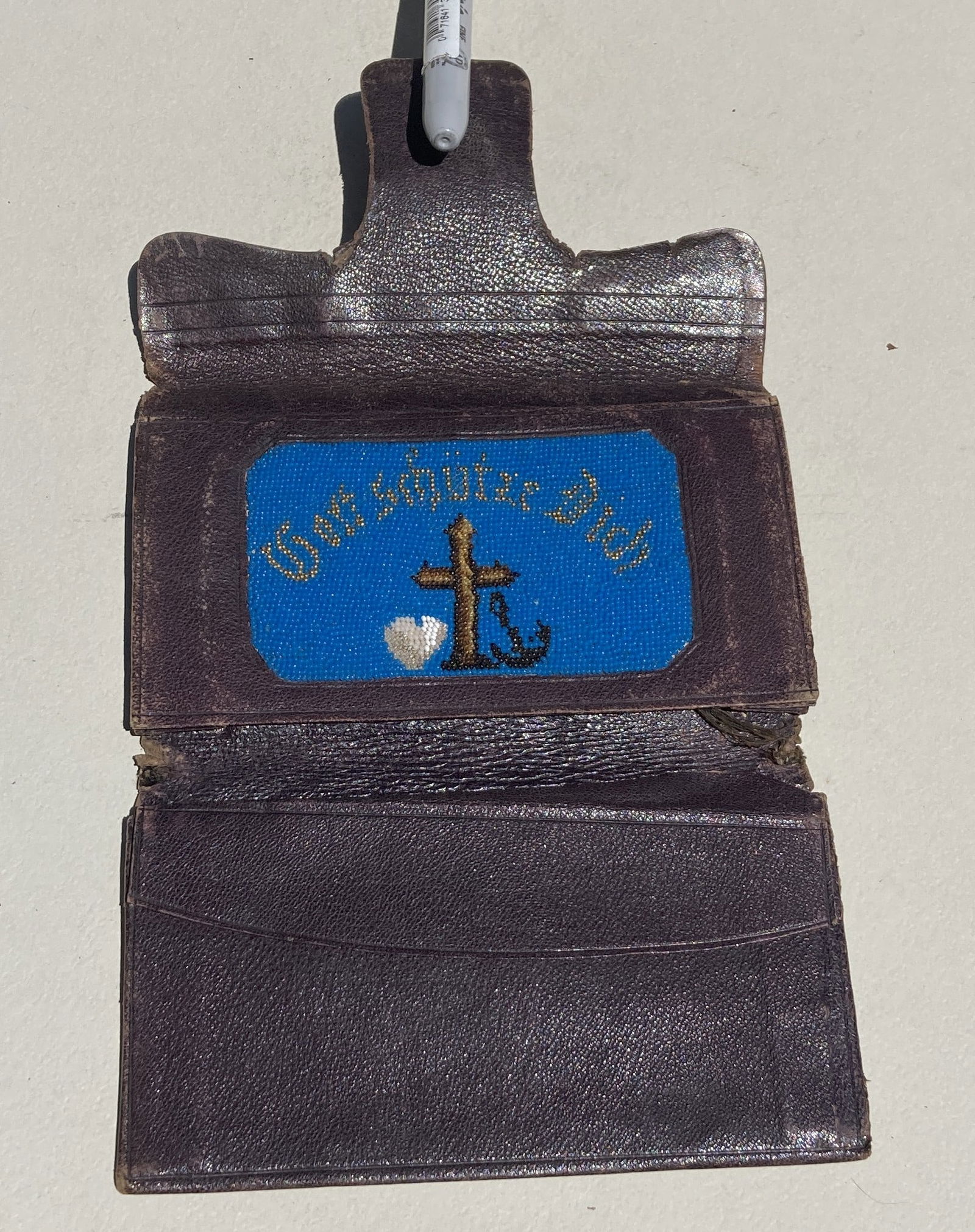 1800s Victorian Beaded Leather Bill Fold Wallet: This is a very nice vintage piece. It is very old and shows its age. It shows wear.