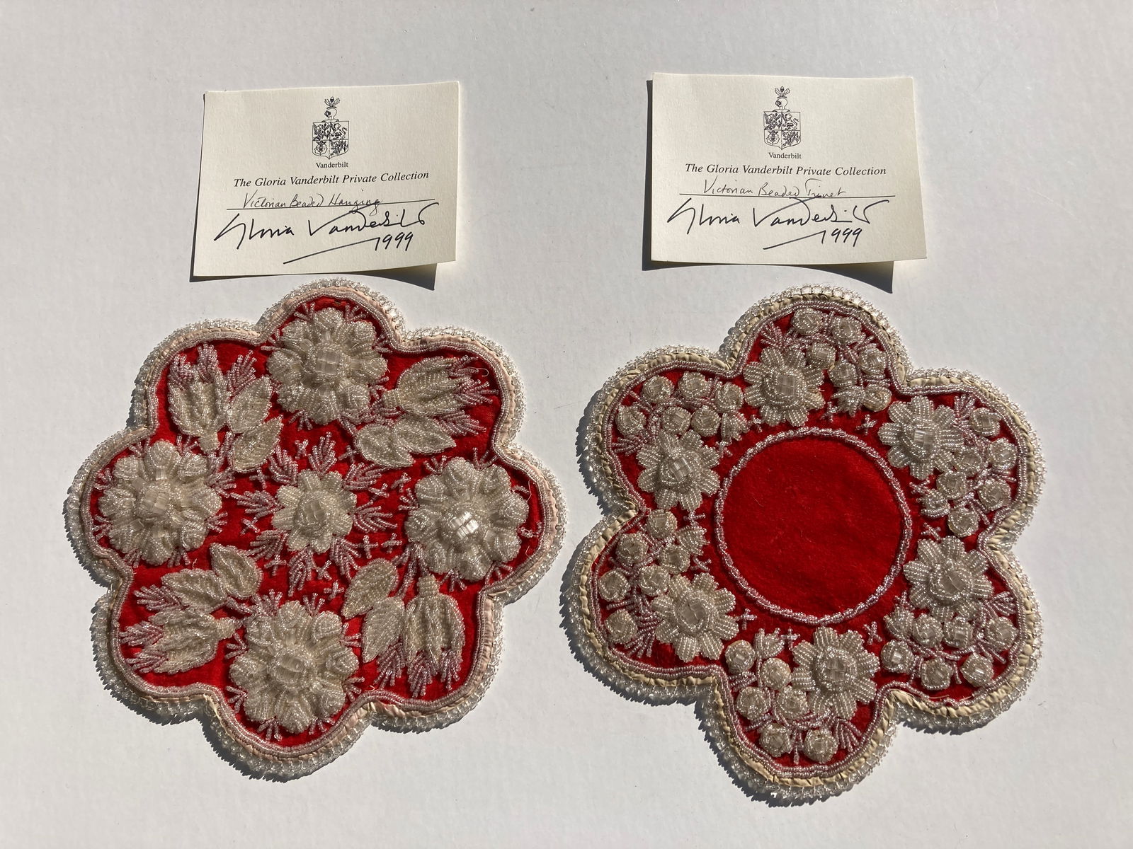 Lot of 2 Gloria Vanderbilt Collection Bead Doillies Placemats Iroqouis: Two pieces from the Gloria Vanderbilt Collection. Appearing of Iroquois origin. Excellent overall condition.
